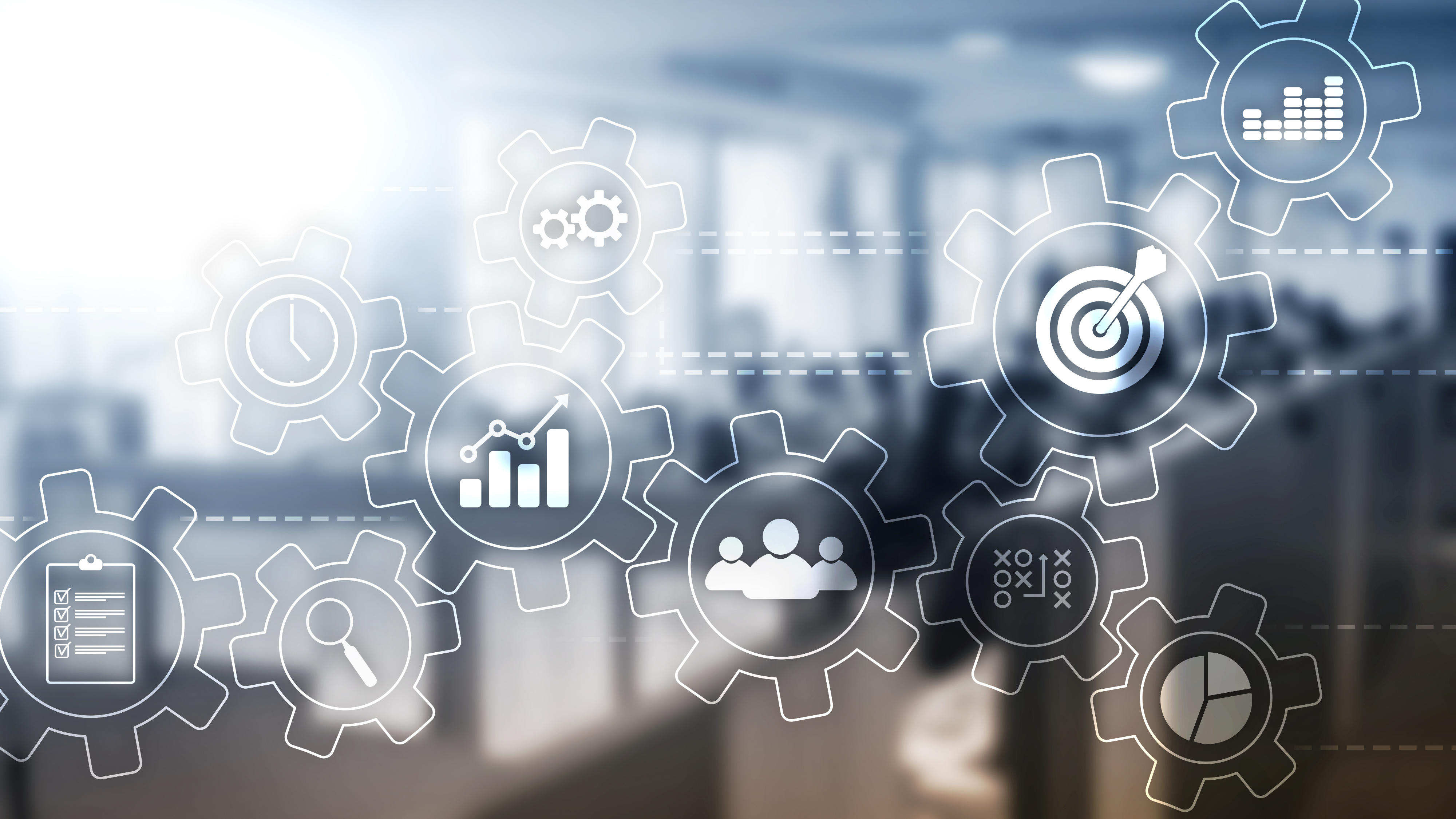 Business automation system with interconnected gears showing analytics, targets, and team collaboration